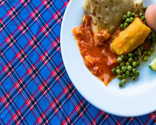 Traditional Mexican lunch dish served with vegetables and corn tortillas
